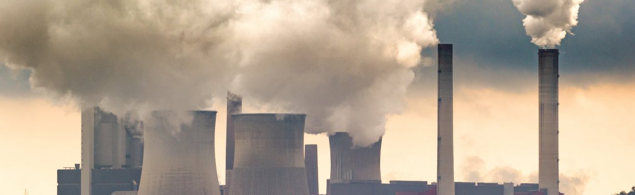 Factory towers belching smoke contributing to Climate Change